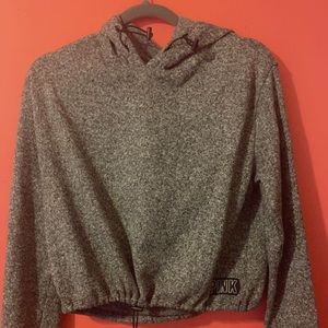 Cropped pink sweater.